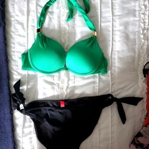 Green top with black bikini bottom